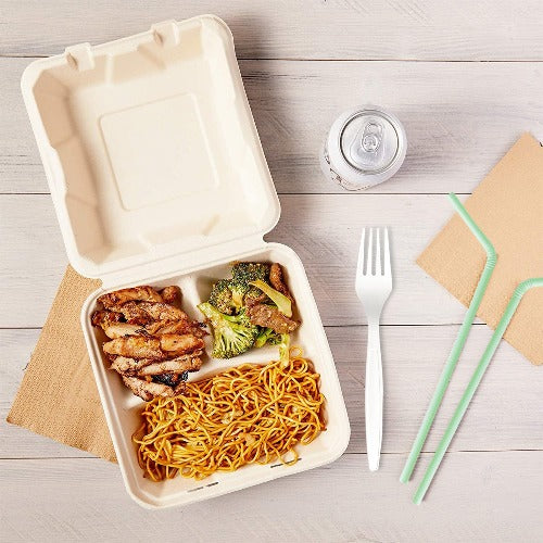Chicken and noodles in a takeout 9 Inch Square Compostable 3 Compartment Clamshell Container on a wooden table. 