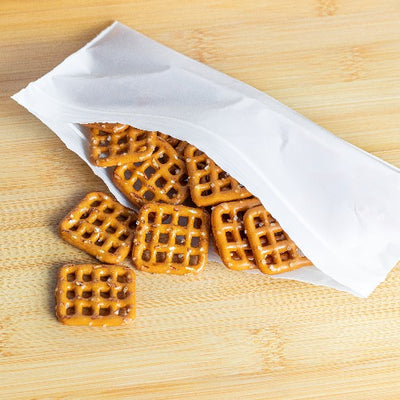 Compostable Snack Resealable Bag with a biscuit inside.